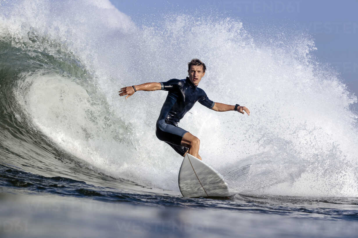 Low angle view of man surfing on sea